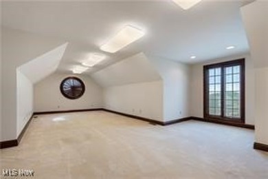 Welcome to this breathtaking brick estate, perfectly positioned on Glenmoor Country Club in Ohio - for sale on GolfHomes.com, golf home, golf lot
