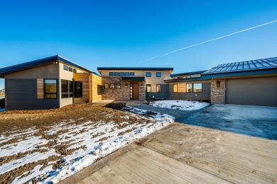 Mountain Modern Retreat in the Powder Horn Golf Community on The Powder Horn Golf Club - Mountain in Wyoming - for sale on GolfHomes.com, golf home, golf lot