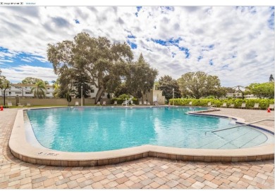 LIGHT AND BRIGHT! 3RD FLOOR, END UNIT WITH PRIME LOCATION! on On Top Of The World Golf Course in Florida - for sale on GolfHomes.com, golf home, golf lot