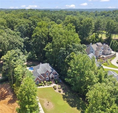 WELCOME HOME TO THIS BEAUTIFUL AND EXPANSIVE HOME FEATURING OVER on Collins Hill Golf Club in Georgia - for sale on GolfHomes.com, golf home, golf lot