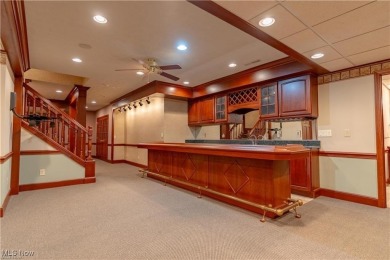 Welcome to this breathtaking brick estate, perfectly positioned on Glenmoor Country Club in Ohio - for sale on GolfHomes.com, golf home, golf lot