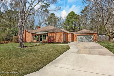 Smart-technology? Yes! Modern conveniences? Yes! Solid brick on Diamondhead Country Club in Mississippi - for sale on GolfHomes.com, golf home, golf lot