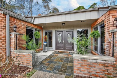 Smart-technology? Yes! Modern conveniences? Yes! Solid brick on Diamondhead Country Club in Mississippi - for sale on GolfHomes.com, golf home, golf lot