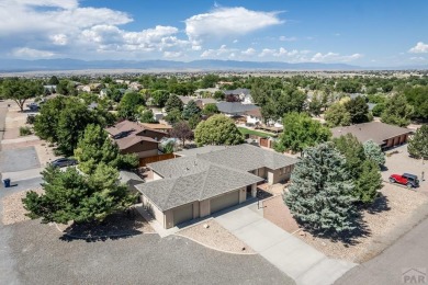 Imagine starting your day with the golf course just steps away on Desert Hawk At Pueblo West in Colorado - for sale on GolfHomes.com, golf home, golf lot