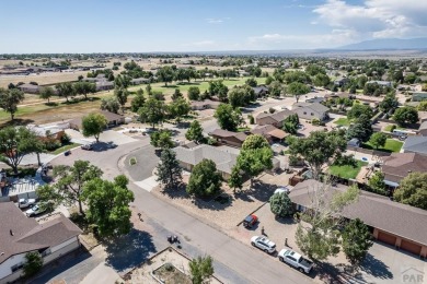 Imagine starting your day with the golf course just steps away on Desert Hawk At Pueblo West in Colorado - for sale on GolfHomes.com, golf home, golf lot