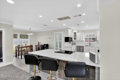 Smart-technology? Yes! Modern conveniences? Yes! Solid brick on Diamondhead Country Club in Mississippi - for sale on GolfHomes.com, golf home, golf lot