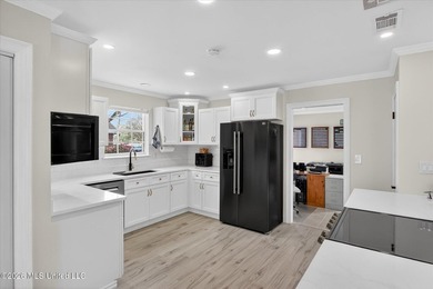 Smart-technology? Yes! Modern conveniences? Yes! Solid brick on Diamondhead Country Club in Mississippi - for sale on GolfHomes.com, golf home, golf lot