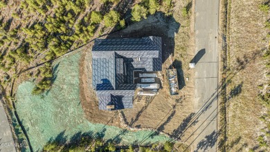 New construction 4 bedroom, 3.5 bathroom home, with views of the on Headwaters Golf Course At Granby Ranch in Colorado - for sale on GolfHomes.com, golf home, golf lot