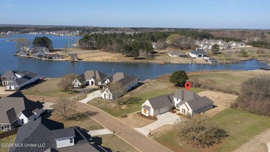 Excellent 4BR/3BA in the Northshore of Lake Caroline offering on Lake Caroline Golf Club in Mississippi - for sale on GolfHomes.com, golf home, golf lot