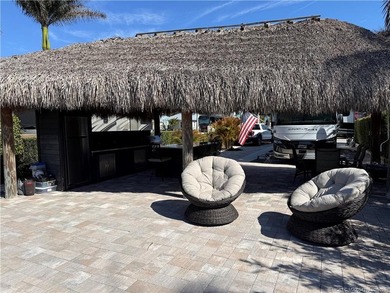 Perfectly positioned within a prestigious Class A-only resort on St. Lucie Trail Golf Club in Florida - for sale on GolfHomes.com, golf home, golf lot