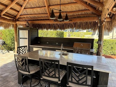 Perfectly positioned within a prestigious Class A-only resort on St. Lucie Trail Golf Club in Florida - for sale on GolfHomes.com, golf home, golf lot