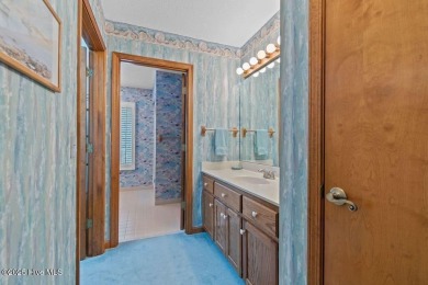 Located in the southern section of the amenity-rich Sea Trail on Sea Trail Golf Resort in North Carolina - for sale on GolfHomes.com, golf home, golf lot