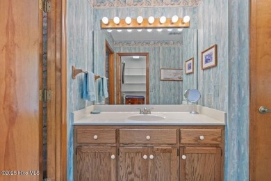 Located in the southern section of the amenity-rich Sea Trail on Sea Trail Golf Resort in North Carolina - for sale on GolfHomes.com, golf home, golf lot