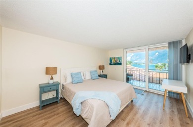 Stunning Condo @ Isla Del Sol with Dual-Purpose Investment: Your on Isla Del Sol Yacht and Country Club in Florida - for sale on GolfHomes.com, golf home, golf lot