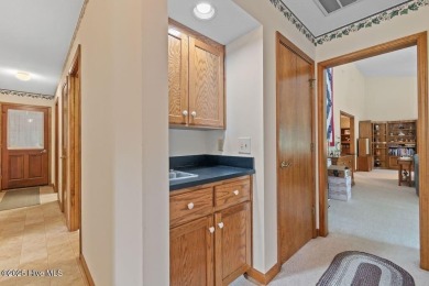 Located in the southern section of the amenity-rich Sea Trail on Sea Trail Golf Resort in North Carolina - for sale on GolfHomes.com, golf home, golf lot