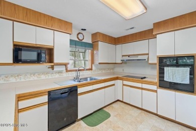 Located in the southern section of the amenity-rich Sea Trail on Sea Trail Golf Resort in North Carolina - for sale on GolfHomes.com, golf home, golf lot