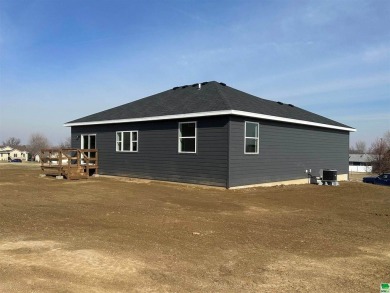 Let's take a look at this new build in Akron, Iowa. This on Akron Golf Course in Iowa - for sale on GolfHomes.com, golf home, golf lot