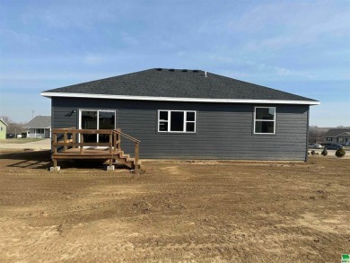 Let's take a look at this new build in Akron, Iowa. This on Akron Golf Course in Iowa - for sale on GolfHomes.com, golf home, golf lot