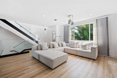 EXQUISITE, TRI-LEVEL FEE SIMPLE 3 BD/2.5 BA TOWNHOUSE, located on Hollywood Beach Golf and Country Club in Florida - for sale on GolfHomes.com, golf home, golf lot