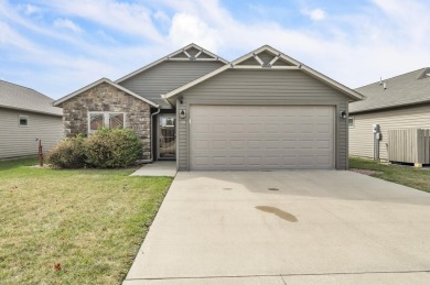 Discover comfort and convenience in this 3-bedroom, 2-bath patio on Spencer Municipal Golf Course in Iowa - for sale on GolfHomes.com, golf home, golf lot