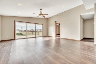 Discover comfort and convenience in this 3-bedroom, 2-bath patio on Spencer Municipal Golf Course in Iowa - for sale on GolfHomes.com, golf home, golf lot