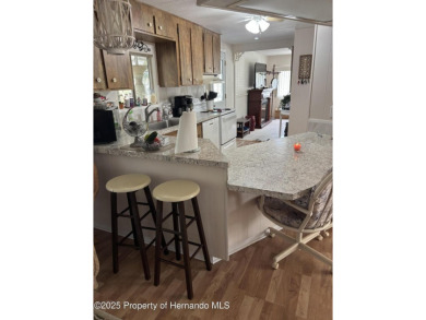 Welcome to your fully furnished Florida retreat in the on Brookridge Country Club in Florida - for sale on GolfHomes.com, golf home, golf lot