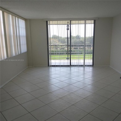 Lovely vacant Corner Unit 2 bedrooms & 2 full baths with amazing on Pembroke Lakes Golf Club in Florida - for sale on GolfHomes.com, golf home, golf lot