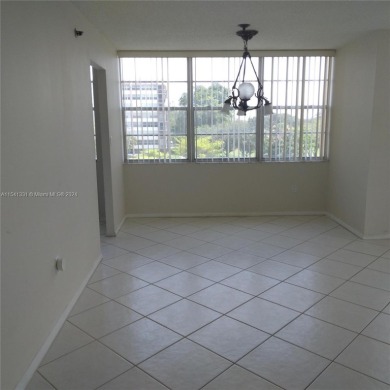 Lovely Corner Unit 2 bedrooms & 2 full baths with amazing and on Pembroke Lakes Golf Club in Florida - for sale on GolfHomes.com, golf home, golf lot