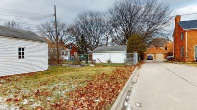 This charming brick bungalow in Grosse Pointe Woods is an ideal on Lochmoor Club in Michigan - for sale on GolfHomes.com, golf home, golf lot