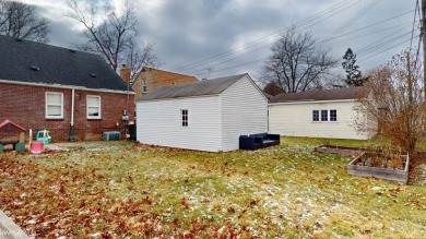 This charming brick bungalow in Grosse Pointe Woods is an ideal on Lochmoor Club in Michigan - for sale on GolfHomes.com, golf home, golf lot