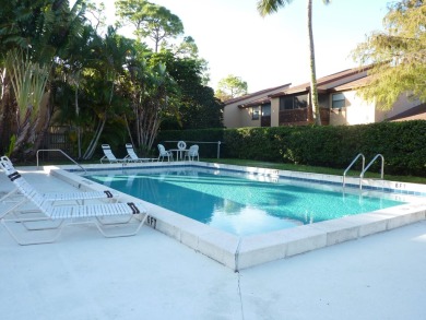 Spacious 2bed/2bath condo. Move-in ready. Excellent location in on Village Golf Club in Florida - for sale on GolfHomes.com, golf home, golf lot