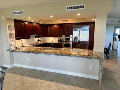 WOW!  HERE IS A IMPRESSIVE CONDOMINIUM WITH A MODERN FLARE THAT on Hammock Bay in Florida - for sale on GolfHomes.com, golf home, golf lot