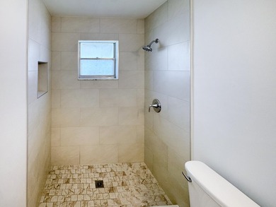 Welcome to 514 SW 20th Street in Palm Beach Leisureville on Leisureville Community Golf Course in Florida - for sale on GolfHomes.com, golf home, golf lot