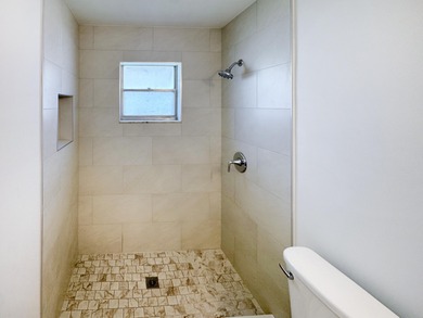 Welcome to 514 SW 20th Street in Palm Beach Leisureville on Leisureville Community Golf Course in Florida - for sale on GolfHomes.com, golf home, golf lot