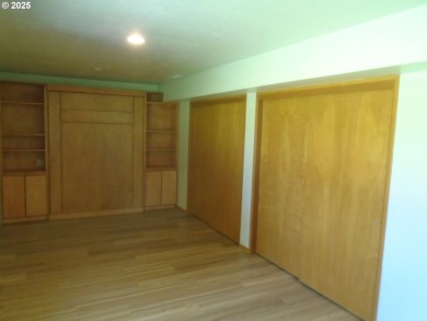 Mid-century modern ranch style home located on the 14th hole of on Club Green Meadows in Washington - for sale on GolfHomes.com, golf home, golf lot