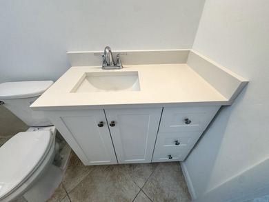 Welcome to 514 SW 20th Street in Palm Beach Leisureville on Leisureville Community Golf Course in Florida - for sale on GolfHomes.com, golf home, golf lot