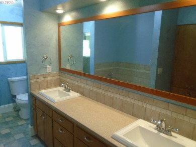 Mid-century modern ranch style home located on the 14th hole of on Club Green Meadows in Washington - for sale on GolfHomes.com, golf home, golf lot