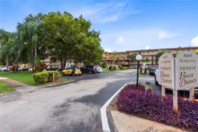 Welcome to this stunning 2-bed 2-bath condo located on the first on Boca Dunes Golf and Country Club in Florida - for sale on GolfHomes.com, golf home, golf lot