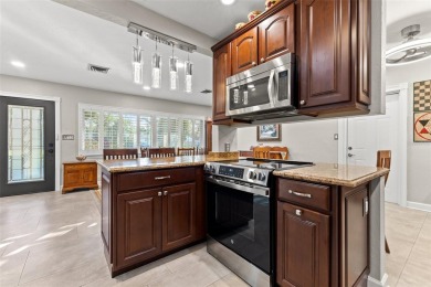 Welcome to an impeccable, move-in-ready corner lot Ranch home in on St. Petersburg Country Club in Florida - for sale on GolfHomes.com, golf home, golf lot