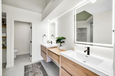 As you walk into this fully remodeled 2-bedroom, 2.5-bath home on  in California - for sale on GolfHomes.com, golf home, golf lot