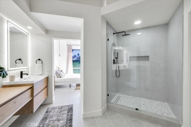 As you walk into this fully remodeled 2-bedroom, 2.5-bath home on  in California - for sale on GolfHomes.com, golf home, golf lot