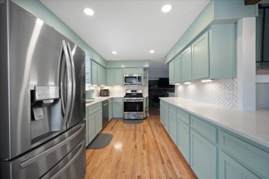 Welcome to this charming split-level brick ranch in the highly on Berkeley Country Club in South Carolina - for sale on GolfHomes.com, golf home, golf lot
