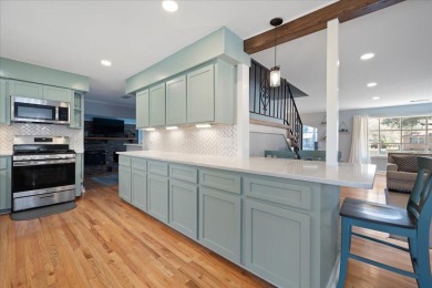 Welcome to this charming split-level brick ranch in the highly on Berkeley Country Club in South Carolina - for sale on GolfHomes.com, golf home, golf lot