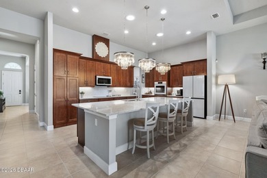 Welcome to 352 Stirling Bridge Drive, an exceptional residence on Plantation Bay Golf and Country Club in Florida - for sale on GolfHomes.com, golf home, golf lot