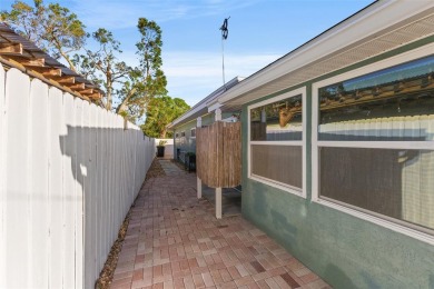 Welcome to an impeccable, move-in-ready corner lot Ranch home in on St. Petersburg Country Club in Florida - for sale on GolfHomes.com, golf home, golf lot