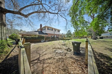 Welcome to this charming split-level brick ranch in the highly on Berkeley Country Club in South Carolina - for sale on GolfHomes.com, golf home, golf lot