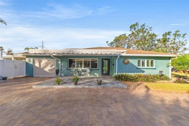 Welcome to an impeccable, move-in-ready corner lot Ranch home in on St. Petersburg Country Club in Florida - for sale on GolfHomes.com, golf home, golf lot