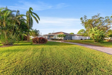 Welcome to an impeccable, move-in-ready corner lot Ranch home in on St. Petersburg Country Club in Florida - for sale on GolfHomes.com, golf home, golf lot