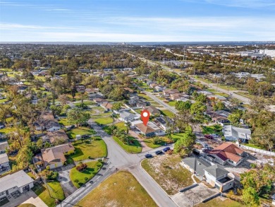 Welcome to an impeccable, move-in-ready corner lot Ranch home in on St. Petersburg Country Club in Florida - for sale on GolfHomes.com, golf home, golf lot