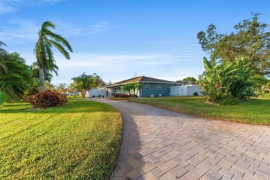 Welcome to an impeccable, move-in-ready corner lot Ranch home in on St. Petersburg Country Club in Florida - for sale on GolfHomes.com, golf home, golf lot